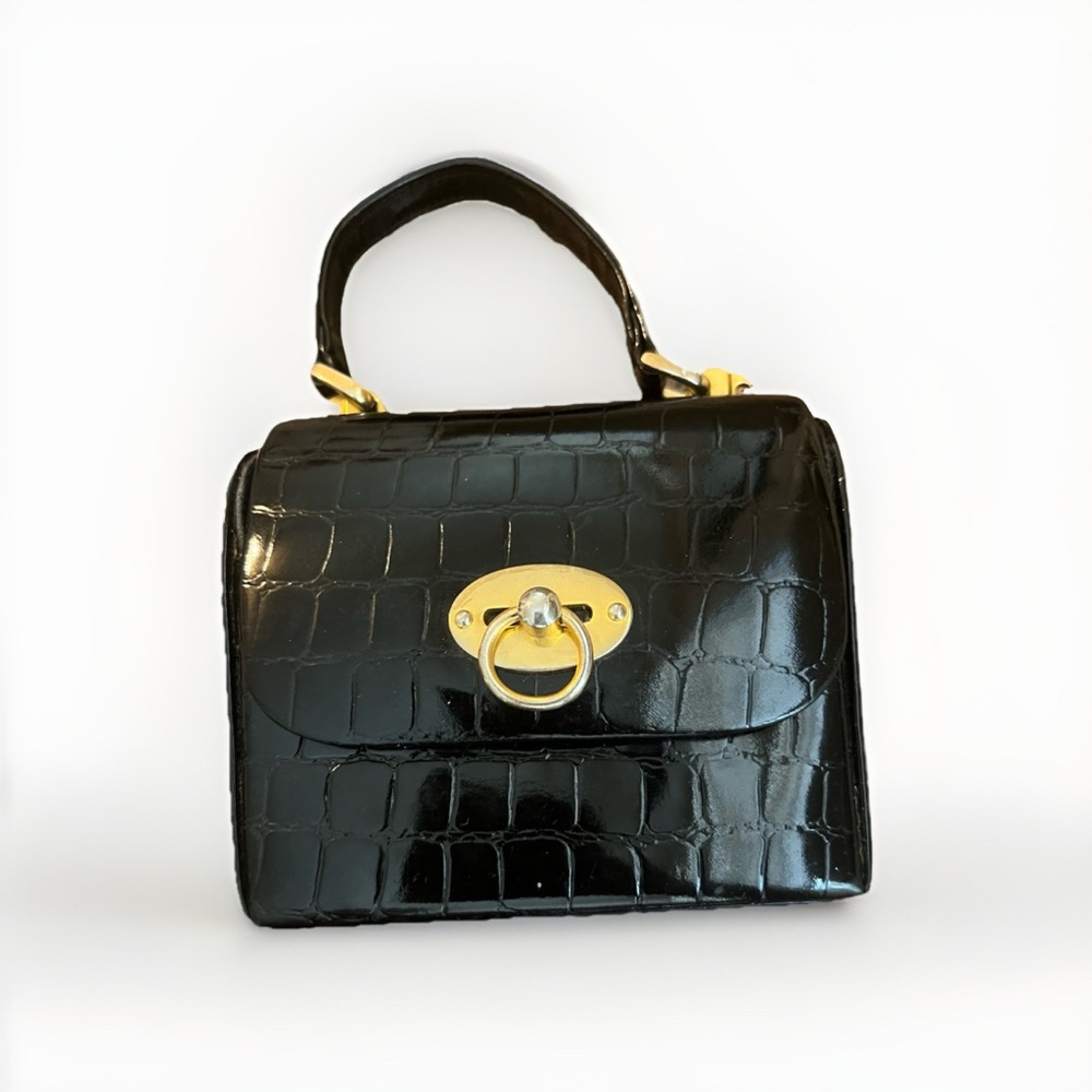 Black, vintage-style top-handle box purse